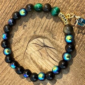 Elegant Black and Gold Beaded Bracelet with Star Charm